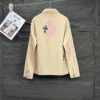 Chrome Hearts Jacke mit rosa und schwarzen Kreuzen